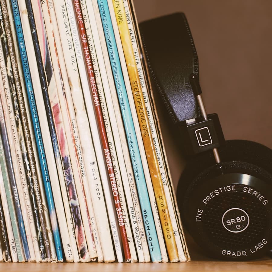 Listening on headphones next to a turntable